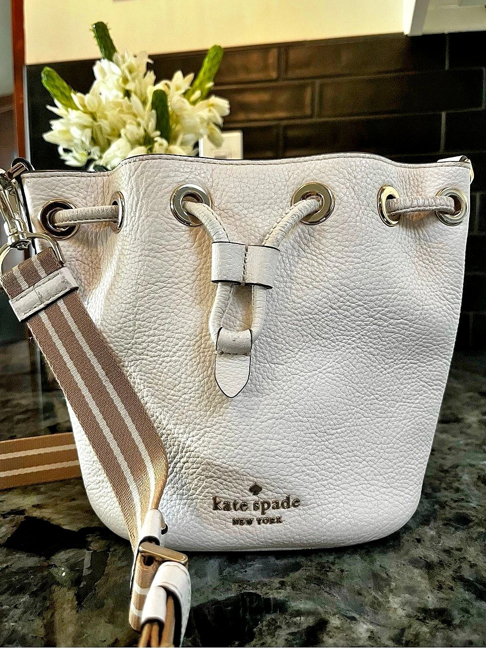 Kate Spade Cream Pebbled Leather Bucket Shoulder Bag with Striped Strap